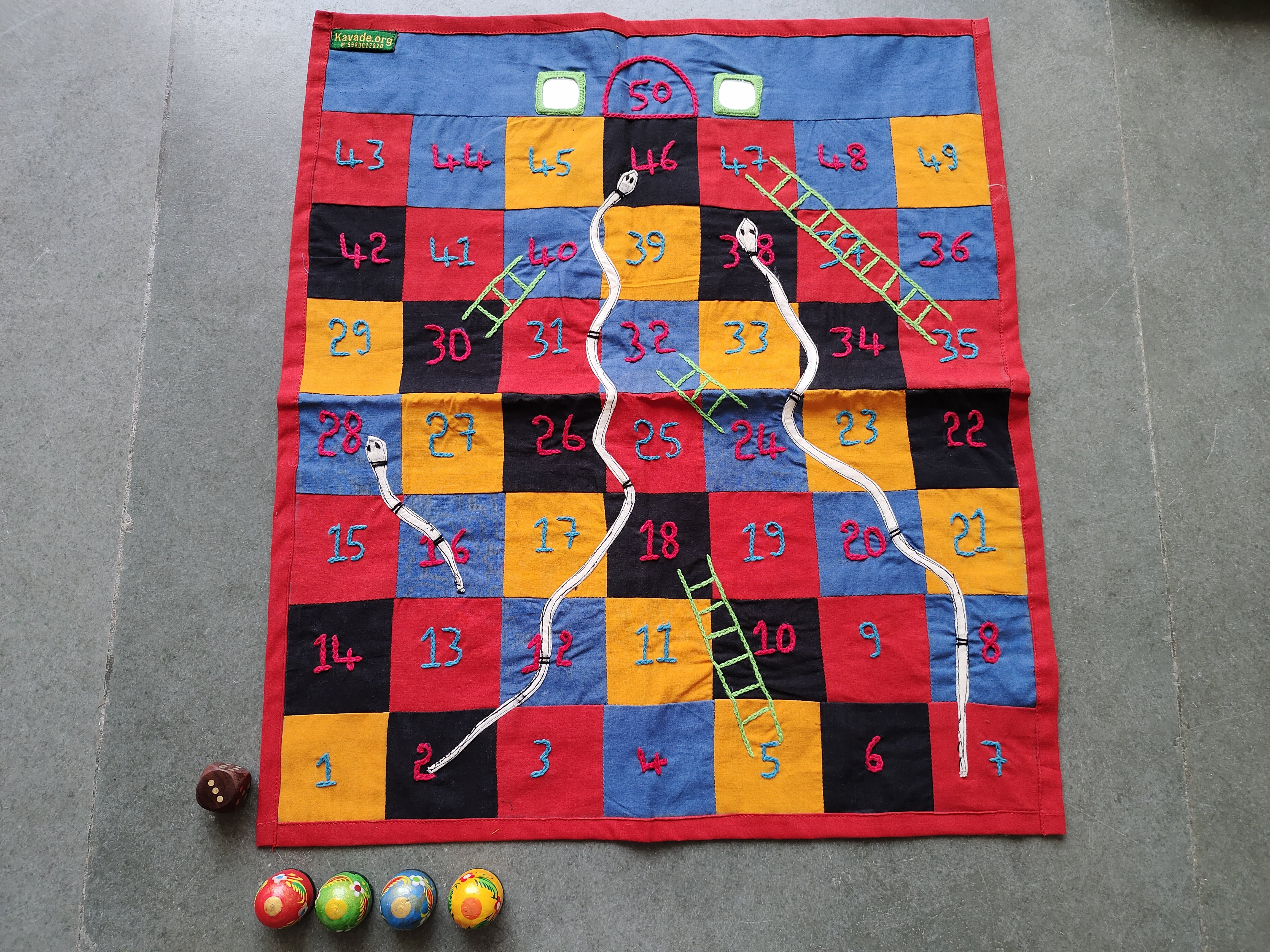 Embroidered snakes & ladders game: 50 squares